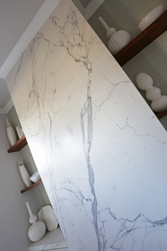 Inspiration for a mid-sized transitional l-shaped marble floor kitchen remodel in DC Metro with an undermount sink, shaker cabinets, white cabinets, quartzite countertops, white backsplash, quartz backsplash and stainless steel appliances