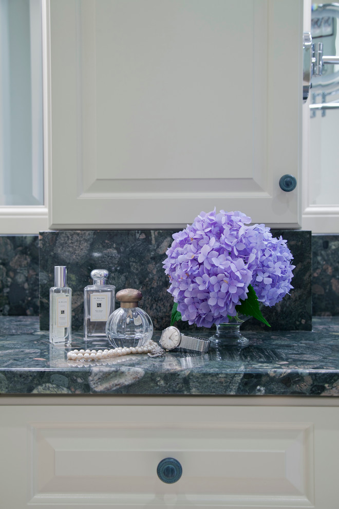 Inspiration for a traditional master bathroom in Bridgeport with an undermount sink, raised-panel cabinets, white cabinets and granite benchtops.