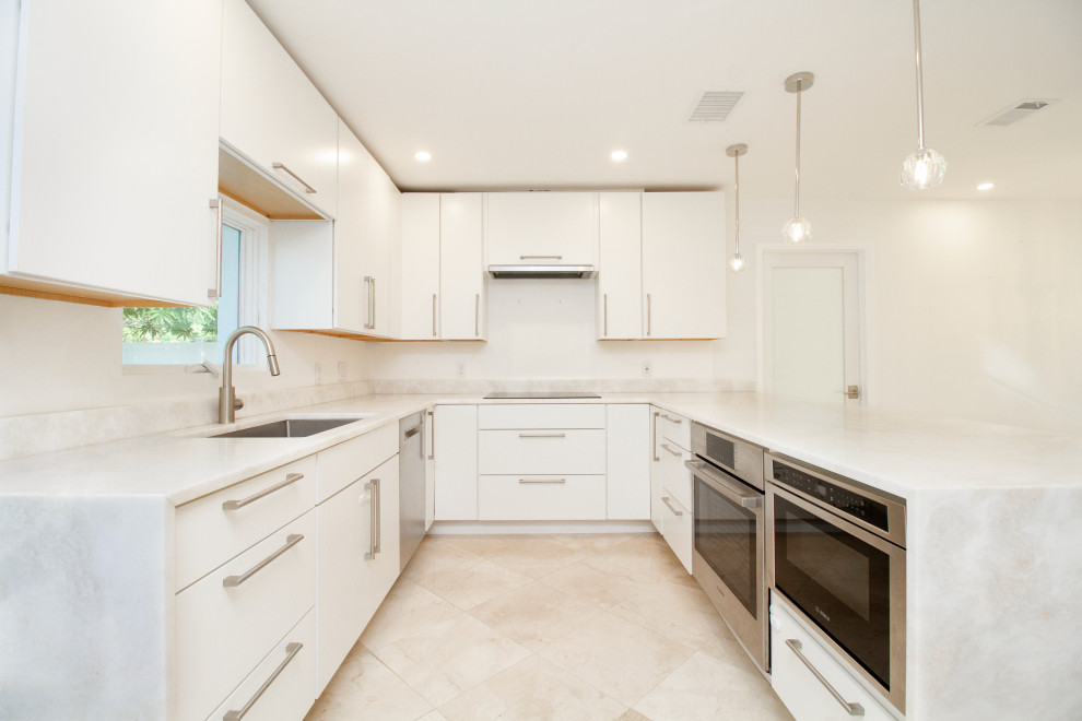 Photo of a small contemporary eat-in kitchen in Tampa with flat-panel cabinets, white cabinets, quartz benchtops, marble floors, a peninsula, beige floor and white benchtop.