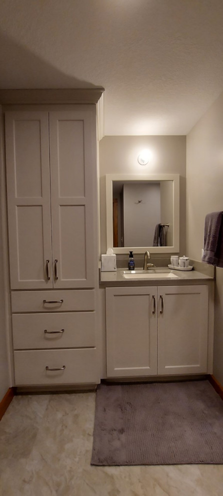 Bathroom - small transitional kids' vinyl floor and single-sink bathroom idea with flat-panel cabinets, white cabinets, an undermount sink, gray countertops and a built-in vanity