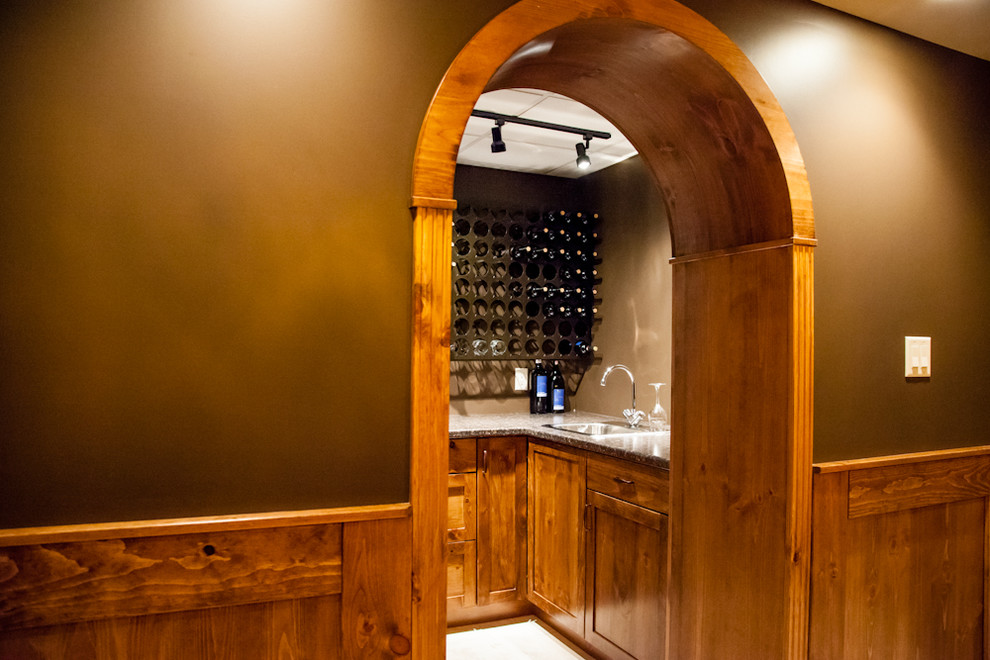 Mountain style basement photo in Toronto