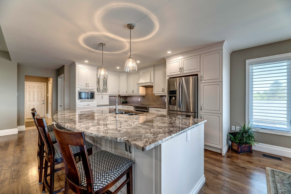 Inspiration for a transitional kitchen remodel with stainless steel appliances