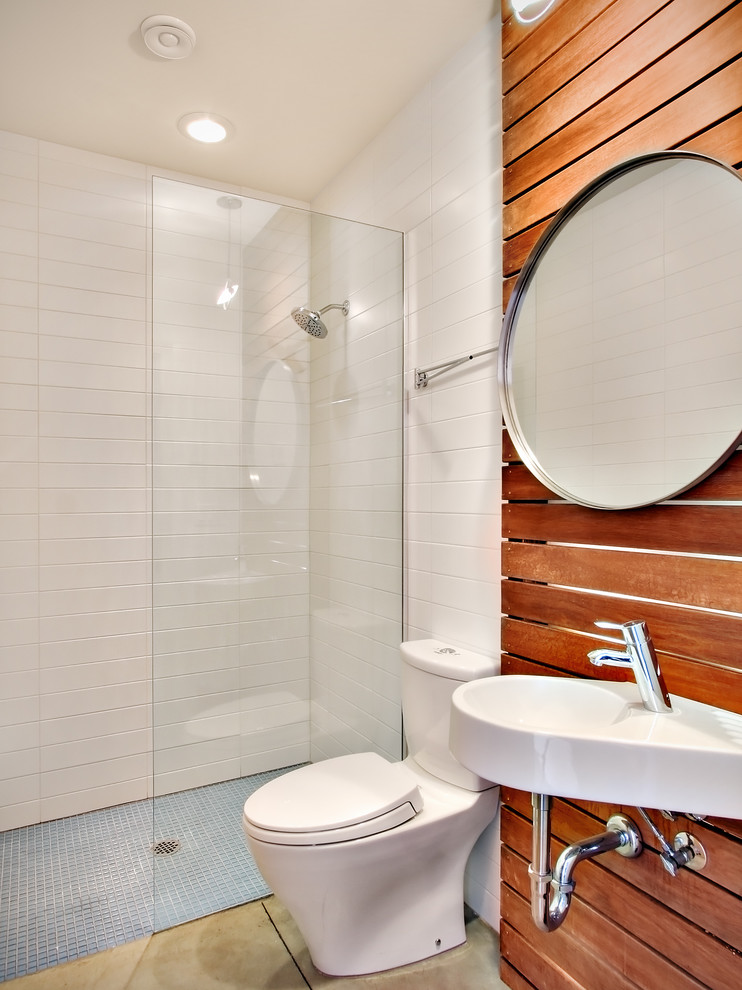 Design ideas for a modern bathroom in Seattle with a wall-mount sink.
