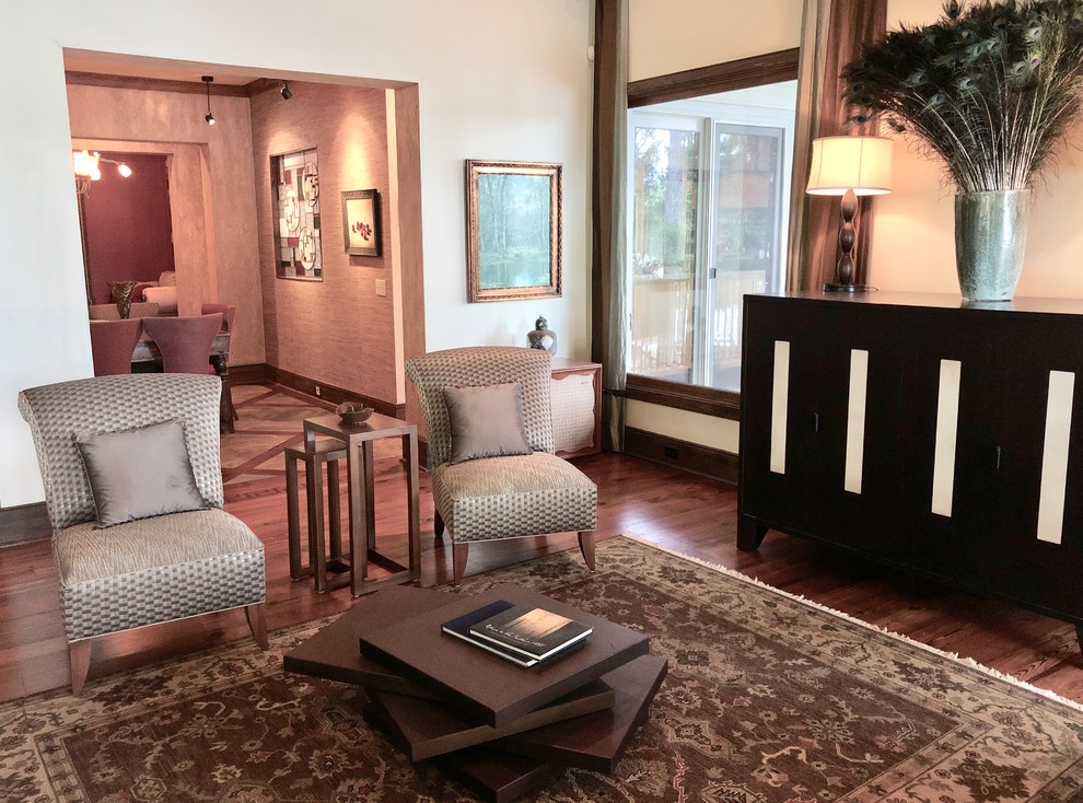 Example of a transitional home design design in Jackson