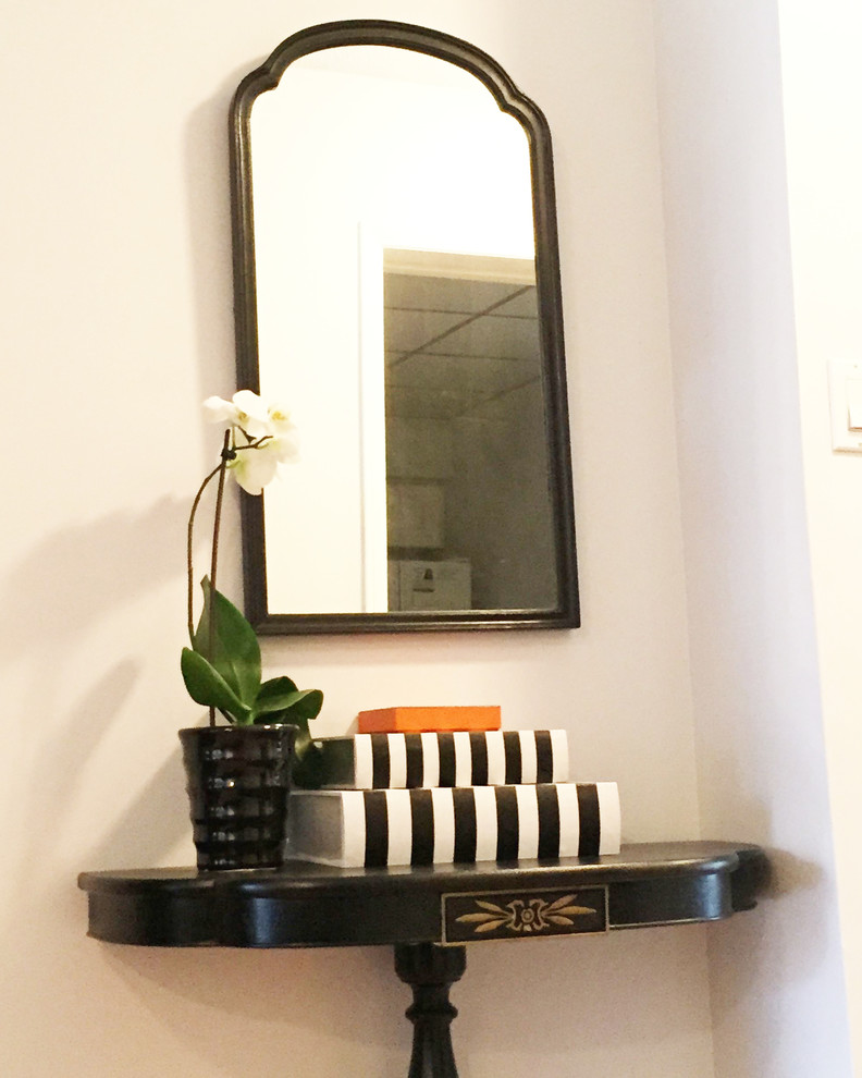 Example of a small transitional light wood floor hallway design in Toronto with gray walls