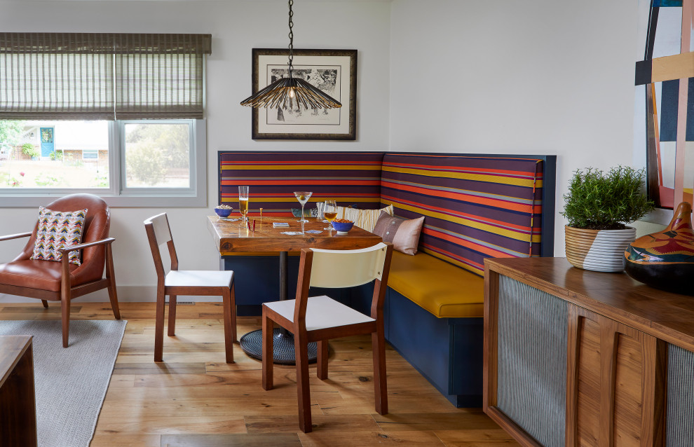 Small 1960s light wood floor great room photo in Denver with white walls and no fireplace