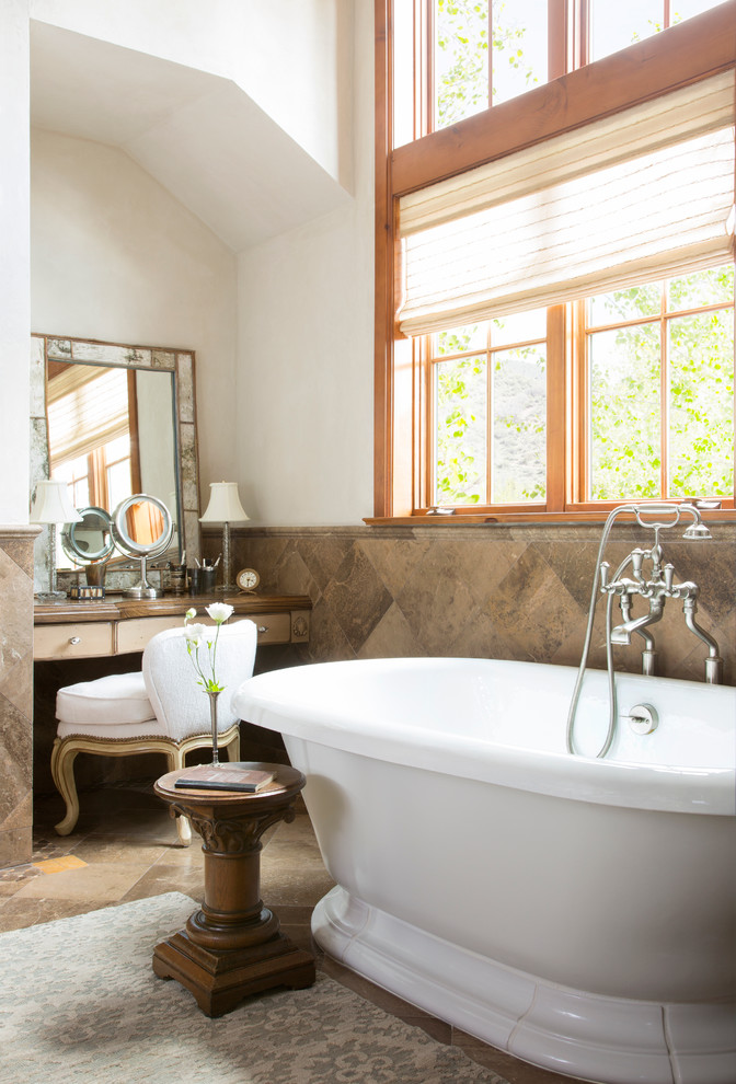Traditional bathroom in Denver with a freestanding tub.