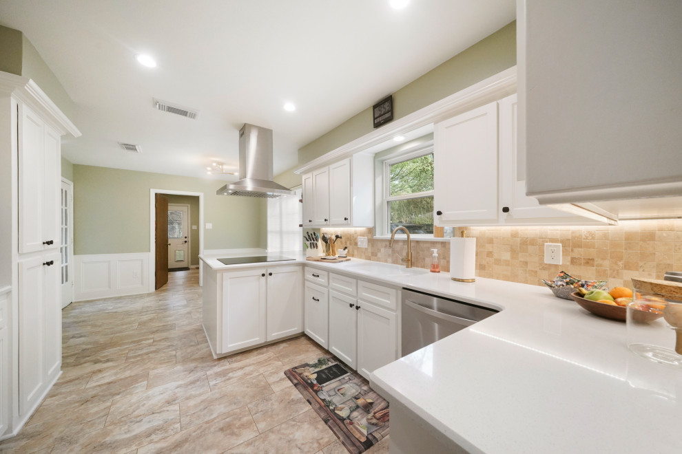 This is an example of a mid-sized contemporary galley eat-in kitchen in Houston with a double-bowl sink, flat-panel cabinets, white cabinets, quartzite benchtops, beige splashback, ceramic splashback, stainless steel appliances, ceramic floors, no island, beige floor, white benchtop and coffered.