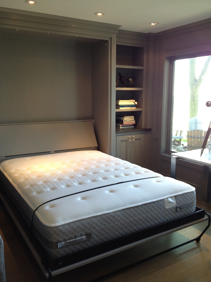 Example of a transitional light wood floor home design design with gray walls