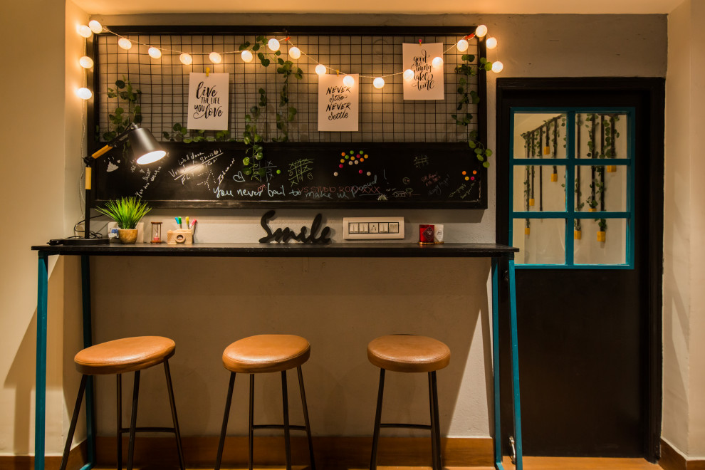 Design ideas for an industrial home bar in Kolkata.