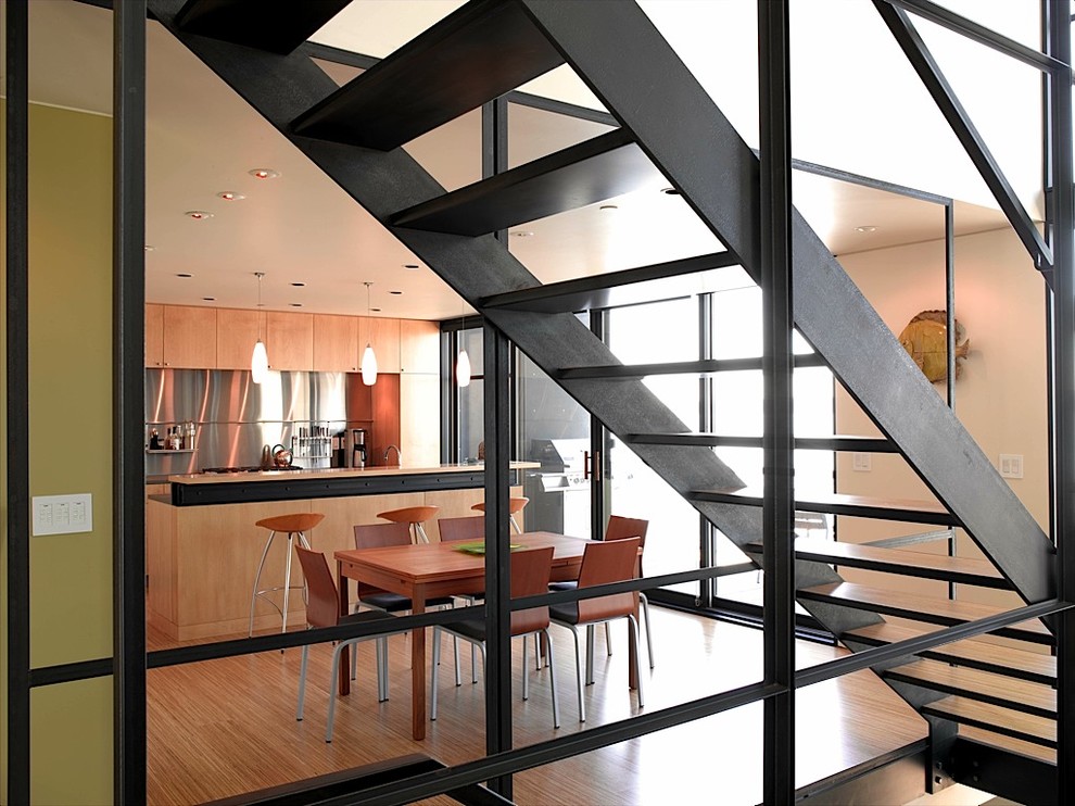 Inspiration for a contemporary wood staircase in Seattle with open risers.