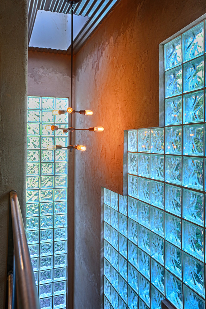 Large industrial metal straight staircase in Los Angeles with metal risers.