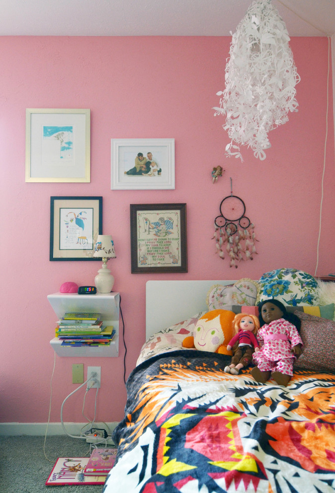 Inspiration for an eclectic kids' bedroom for girls in Dallas with pink walls.