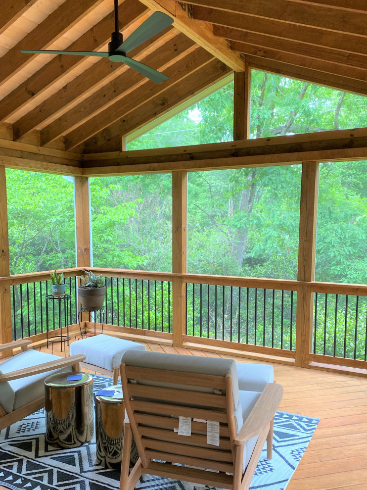 Wood screenedin porch featuring a ceiling fan Porch Raleigh by Archadeck of Raleigh