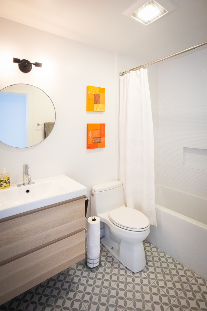 Inspiration for a small contemporary kids bathroom in Los Angeles with an alcove tub, white tile, ceramic tile, white walls, ceramic floors and grey floor.