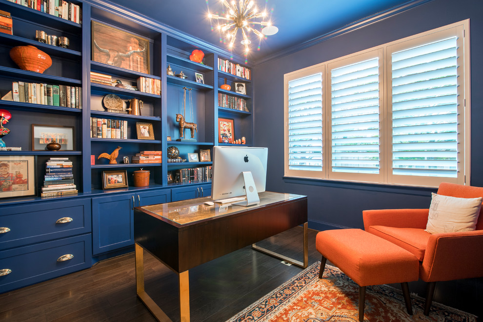 Design ideas for a mid-sized contemporary home office in Houston with blue walls and a freestanding desk.