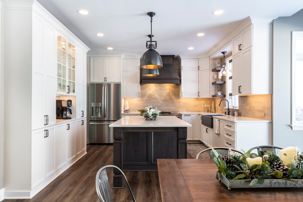 Kitchen - transitional kitchen idea with quartz countertops, ceramic backsplash, stainless steel appliances and white countertops
