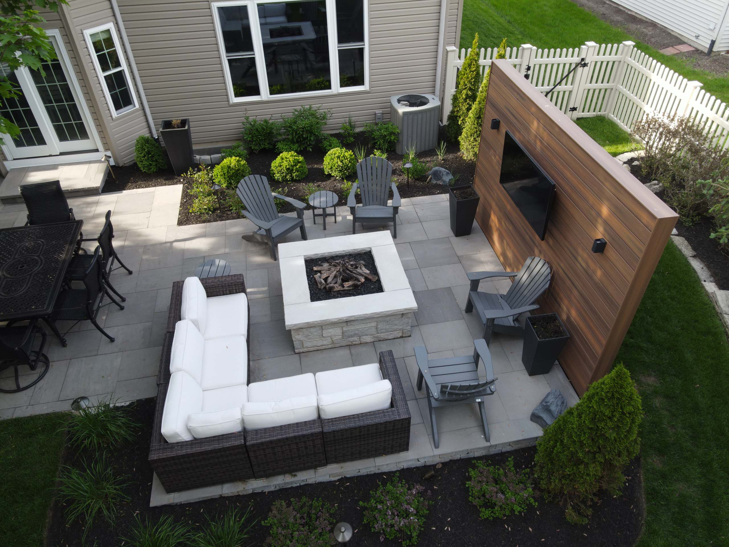 Outdoor Great Room featuring TV & Gas Fire Pit