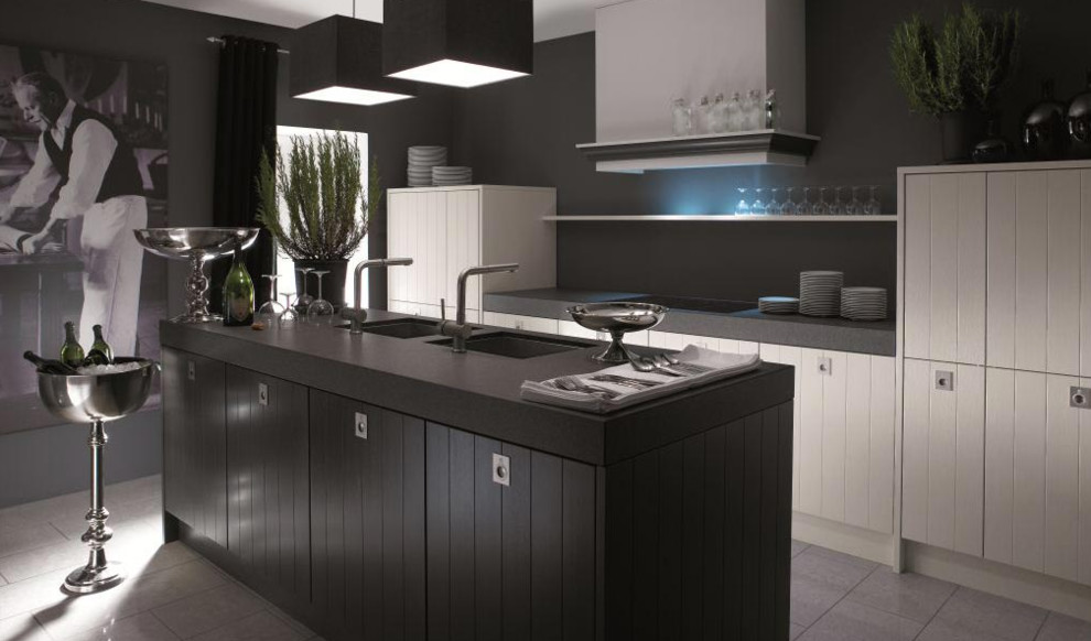 Eat-in kitchen - large transitional galley porcelain tile eat-in kitchen idea in Toronto with an undermount sink, solid surface countertops, stainless steel appliances and an island