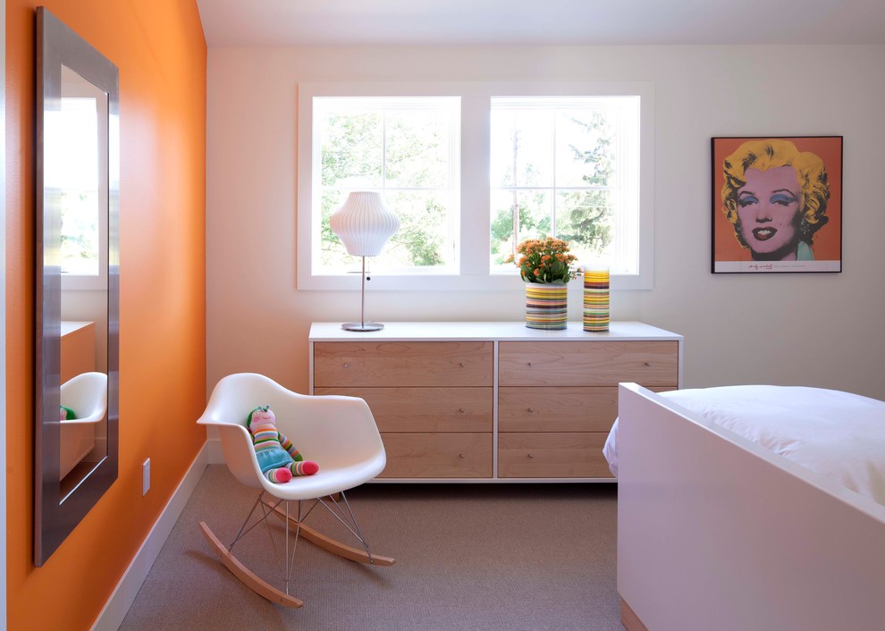 Design ideas for a contemporary bedroom in Minneapolis with orange walls and carpet.