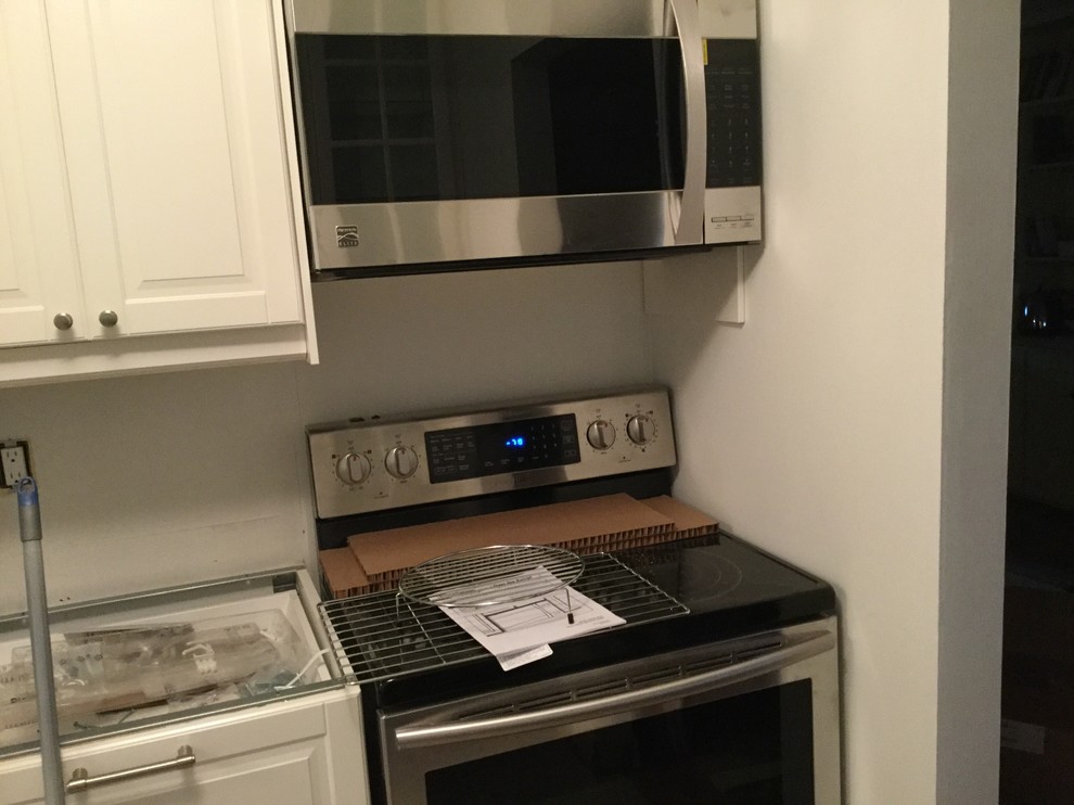 kitchen stove against wall