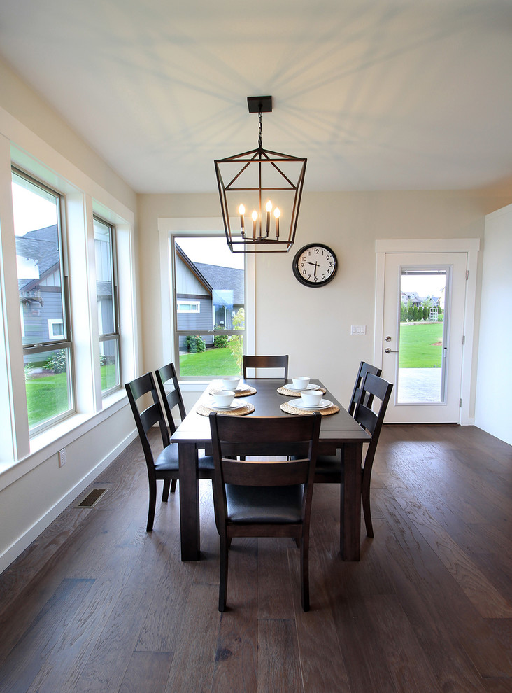 Design ideas for a large country open plan dining in Seattle with grey walls, dark hardwood floors and no fireplace.