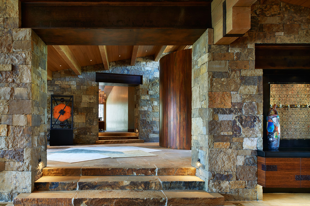Large mountain style foyer photo in Denver
