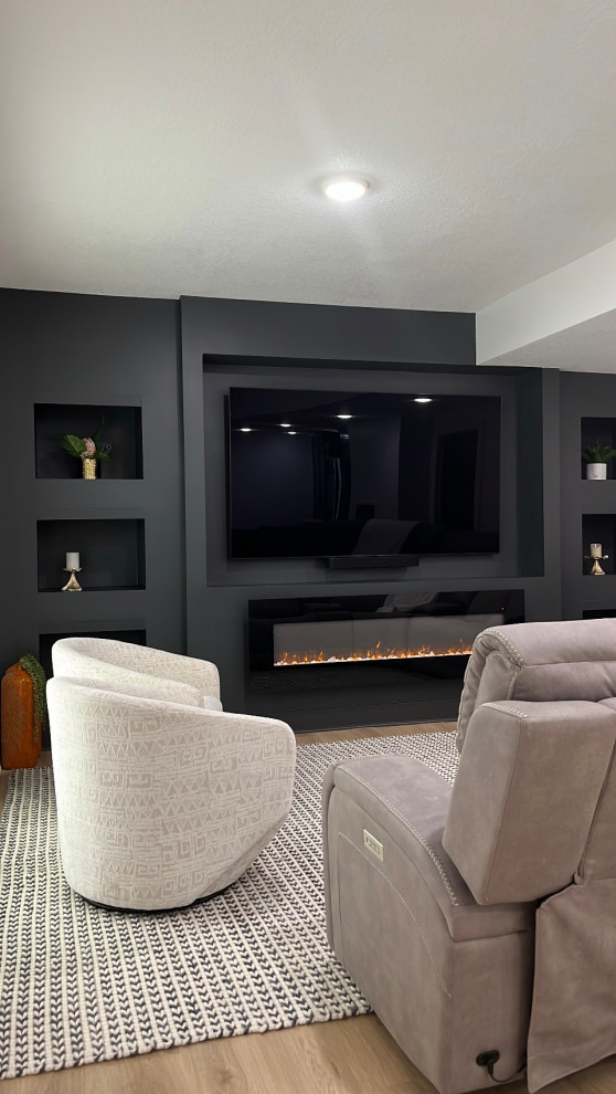 Basement - large contemporary look-out vinyl floor and beige floor basement idea in Kansas City with a home theater and white walls
