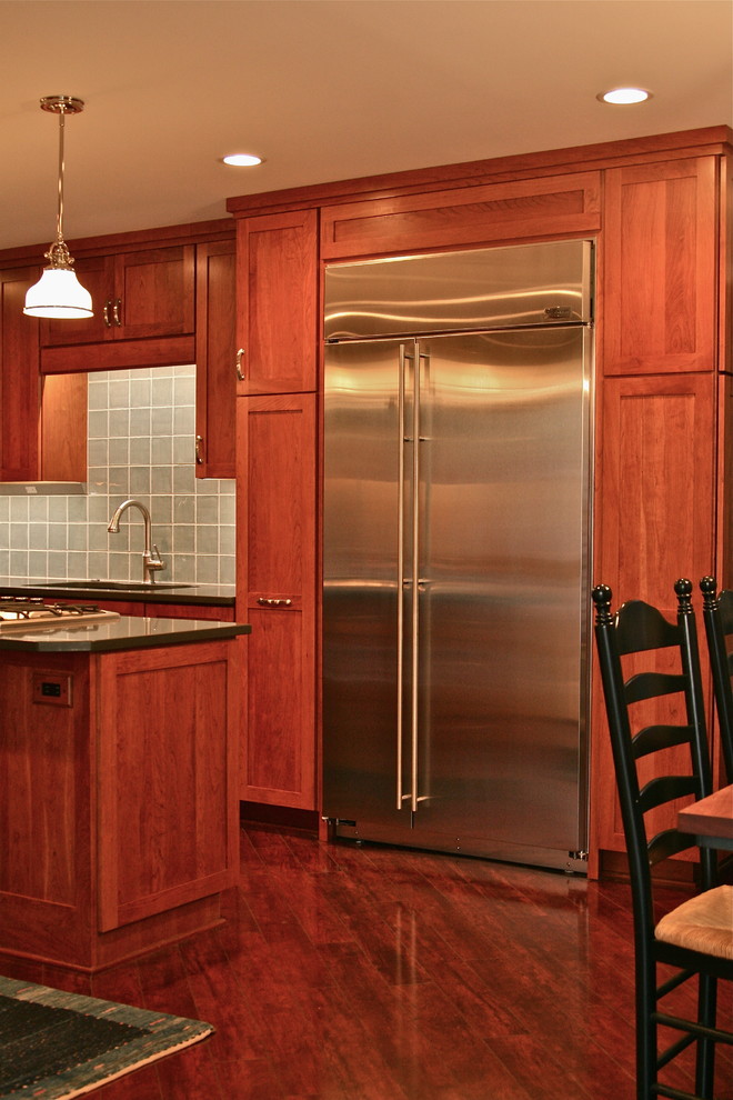 Kitchen - transitional laminate floor kitchen idea in DC Metro with shaker cabinets, quartz countertops, blue backsplash and porcelain backsplash