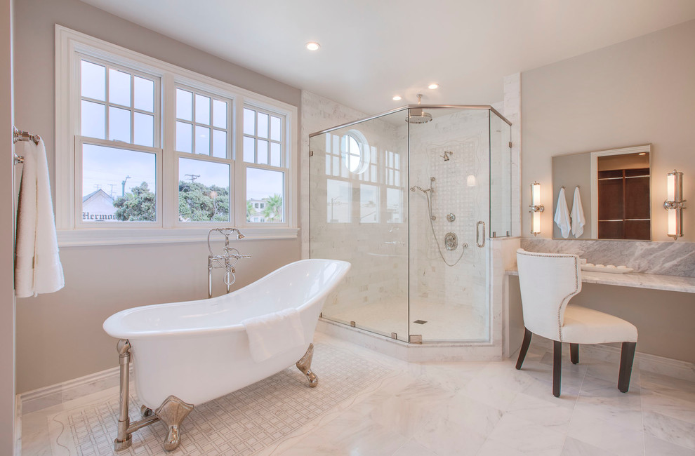Traditional master bathroom in San Diego with a claw-foot tub, beige walls, white cabinets, a corner shower, marble, marble floors and marble benchtops.