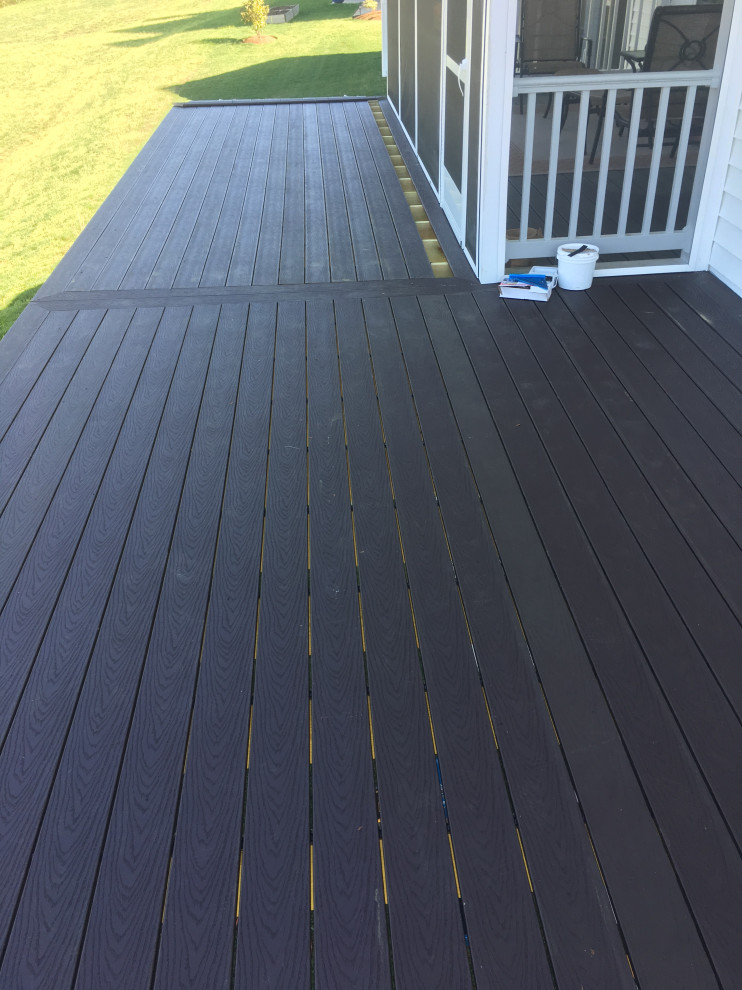 Inspiration for a large backyard second story cable railing deck remodel in Baltimore