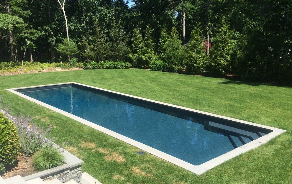 Large contemporary backyard rectangular lap pool in New York.