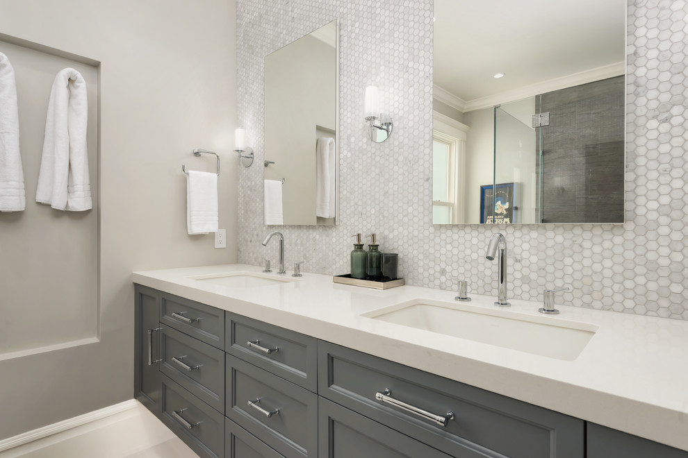 Design ideas for a large transitional master bathroom in San Francisco with beaded inset cabinets, grey cabinets, a curbless shower, a one-piece toilet, gray tile, marble, grey walls, ceramic floors, an undermount sink, engineered quartz benchtops, beige floor and a hinged shower door.