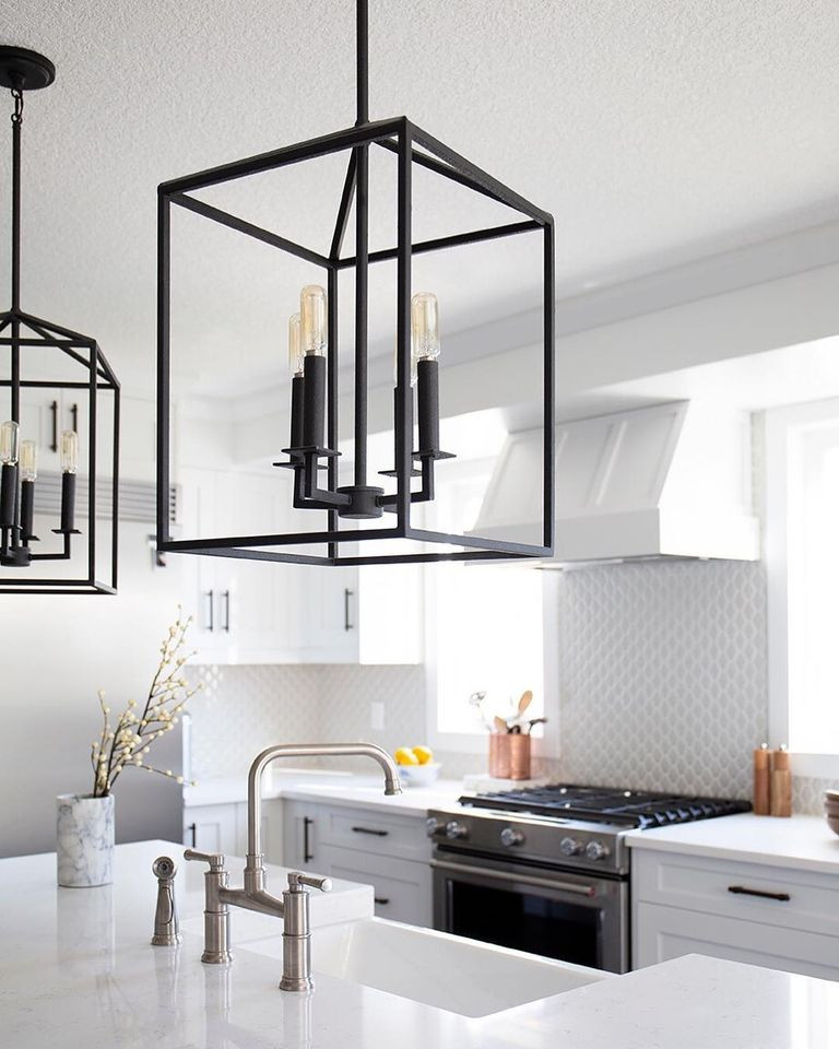 Example of a transitional kitchen design in Calgary