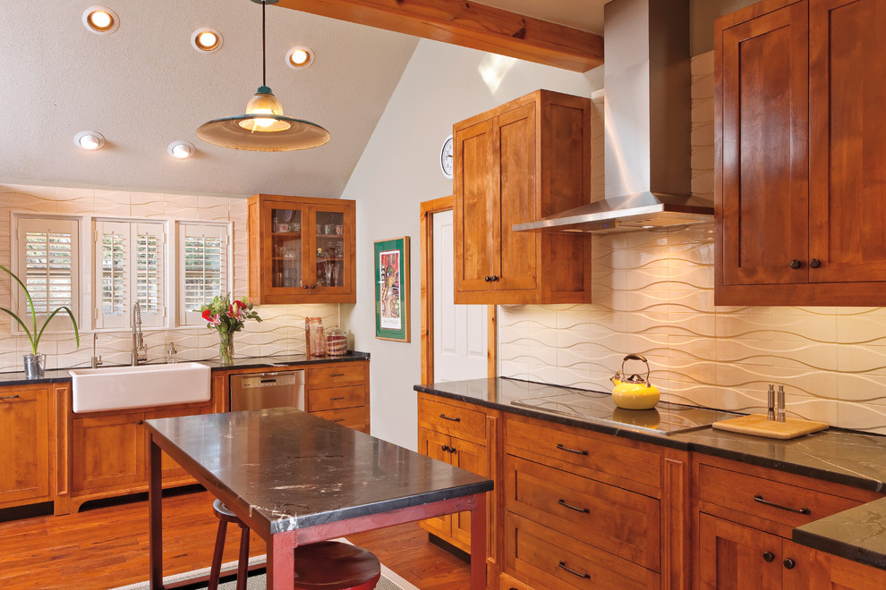 Example of a transitional eat-in kitchen design in Austin with a farmhouse sink, an island, soapstone countertops, white backsplash and ceramic backsplash