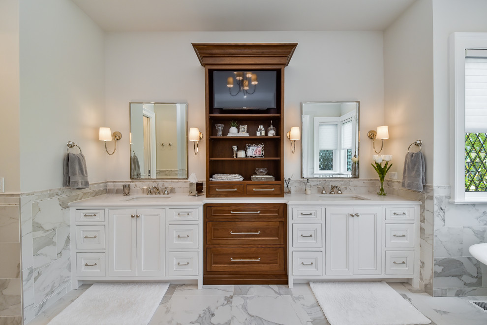 Design ideas for a large traditional master bathroom in Chicago with raised-panel cabinets, white cabinets, a freestanding tub, an open shower, a two-piece toilet, gray tile, marble, beige walls, marble floors, an undermount sink, marble benchtops, grey floor, a hinged shower door, white benchtops, an enclosed toilet, a double vanity and a built-in vanity.