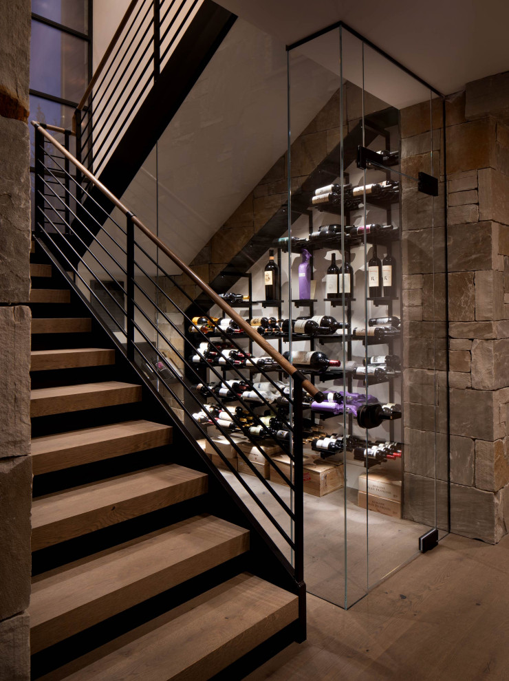 Wine cellar - rustic medium tone wood floor wine cellar idea