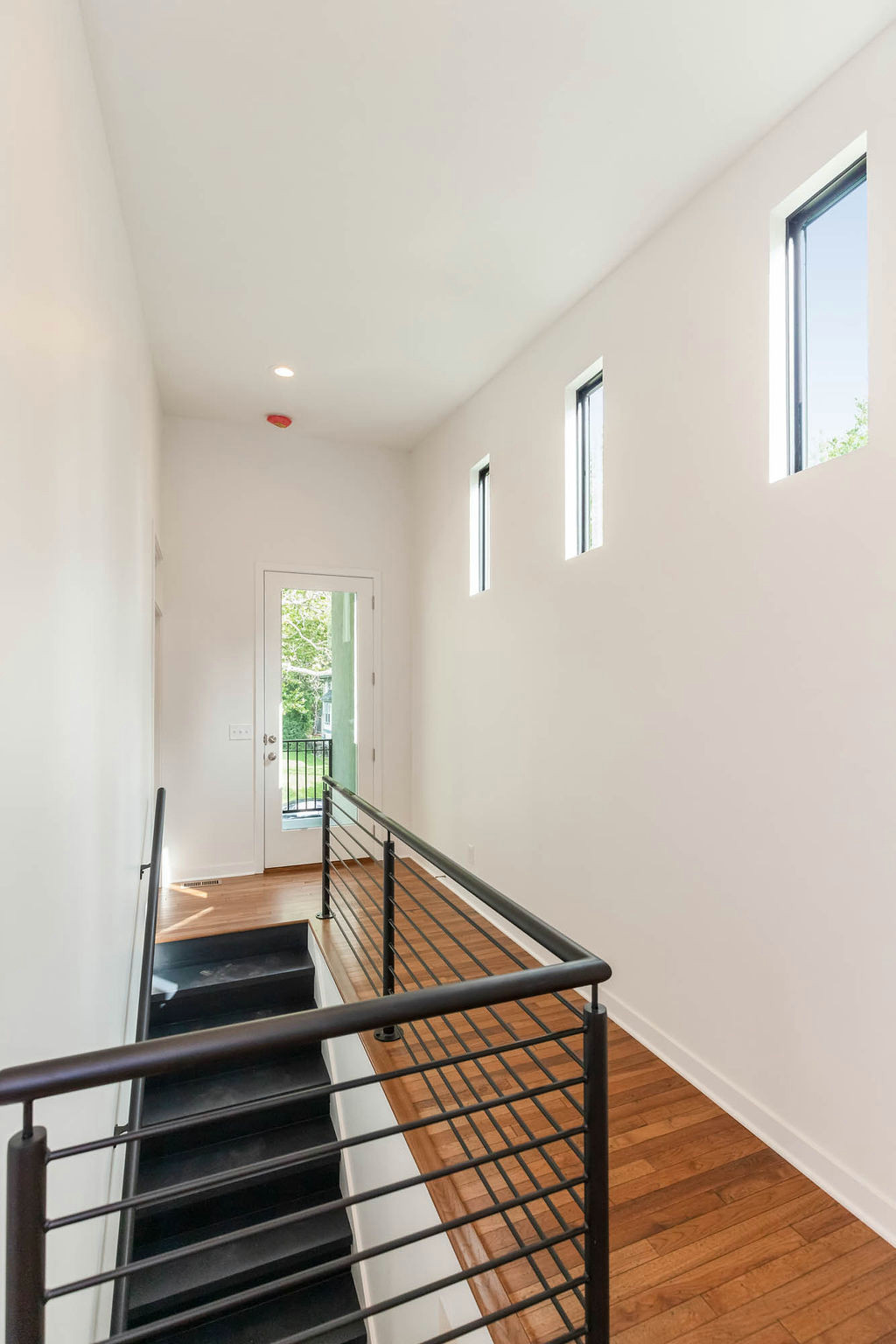 4030 Forest (stairwell (custom rail), upstairs hallway)