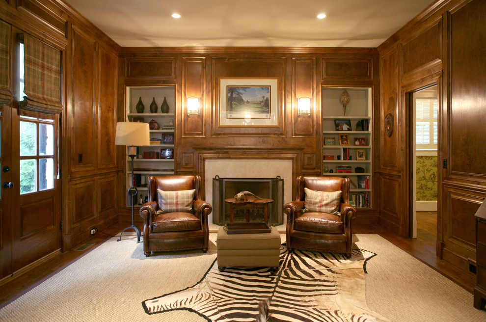 Inspiration for a traditional home office in Atlanta with dark hardwood floors and a standard fireplace.