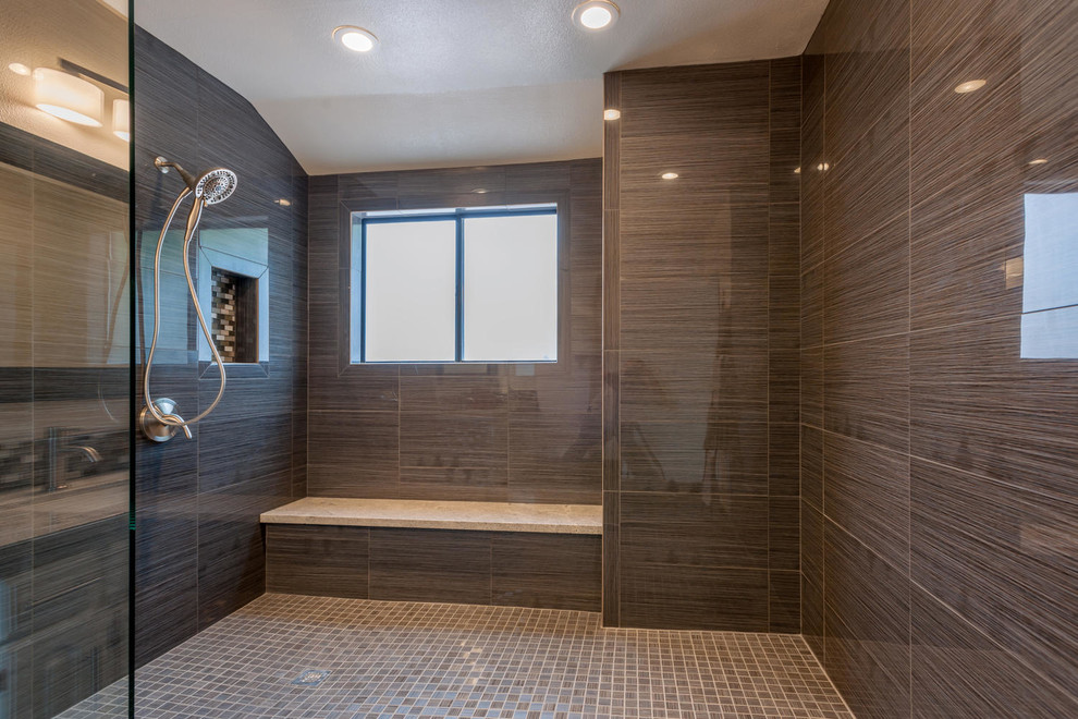 Example of a mid-sized transitional master gray tile and porcelain tile porcelain tile and gray floor doorless shower design with raised-panel cabinets, white cabinets, white walls, an undermount sink, granite countertops and gray countertops