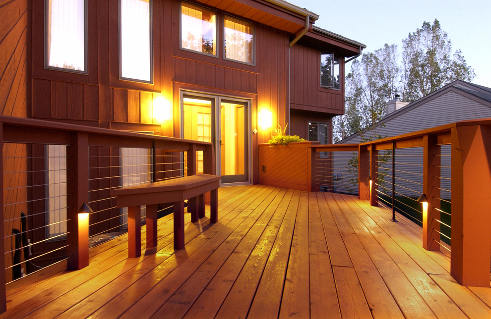 This is an example of a mid-sized contemporary deck in Other with no cover and mixed railing.