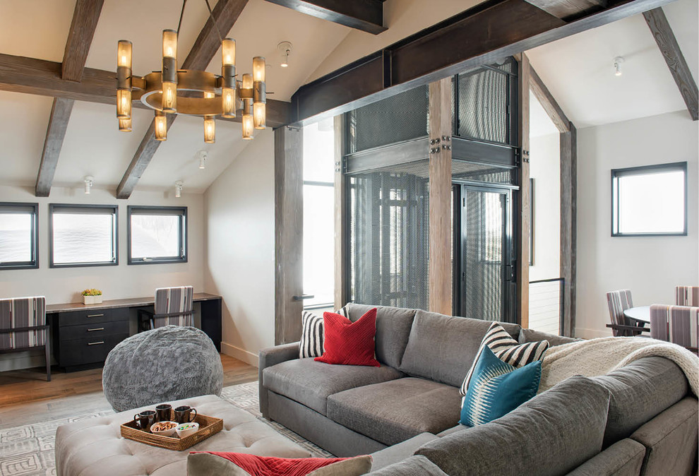 Mountain Peek - Mountain Peek is a custom residence located within the Yellowstone Club in Big Sky, Montana. The layout of the home was heavily influenced by the site. Instead of building up vertically the floor plan reaches out horizontally with slight elevations between different spaces. This allowed for beautiful views from every space and also gave us the ability to play with roof heights for each individual space. Natural stone and rustic wood are accented by steal beams and metal work throughout the home.

(photos by Whitney Kamman)