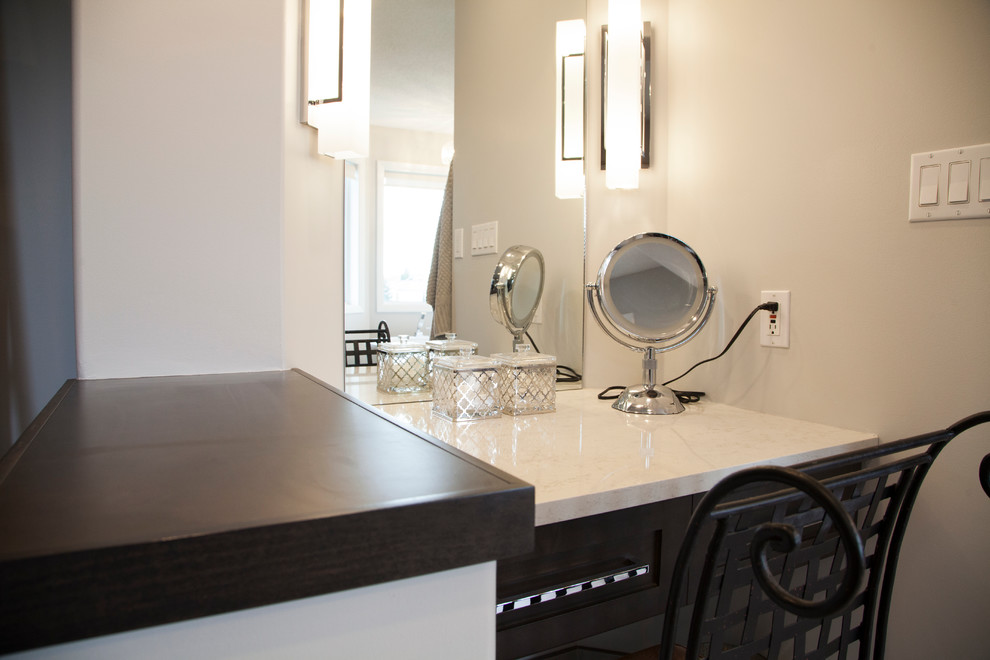 Inspiration for a large transitional master beige tile and glass sheet porcelain tile freestanding bathtub remodel in Edmonton with shaker cabinets, brown cabinets, a two-piece toilet, beige walls, an undermount sink and quartz countertops