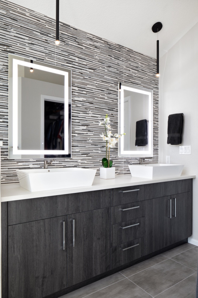 Large contemporary master bathroom in Denver with flat-panel cabinets, white cabinets, a freestanding tub, an open shower, multi-coloured tile, white walls, slate floors, a vessel sink, quartzite benchtops, grey floor, a hinged shower door, white benchtops, a single vanity and a built-in vanity.