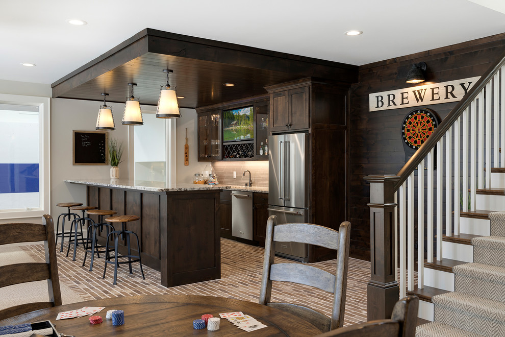 Design ideas for an u-shaped seated home bar in Minneapolis with an undermount sink, flat-panel cabinets, dark wood cabinets, granite benchtops, multi-coloured splashback, ceramic splashback, brick floors, multi-coloured floor and multi-coloured benchtop.