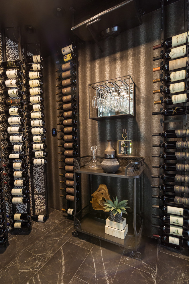 Inspiration for a mid-sized modern wine cellar in Los Angeles with porcelain floors, storage racks and black floor.