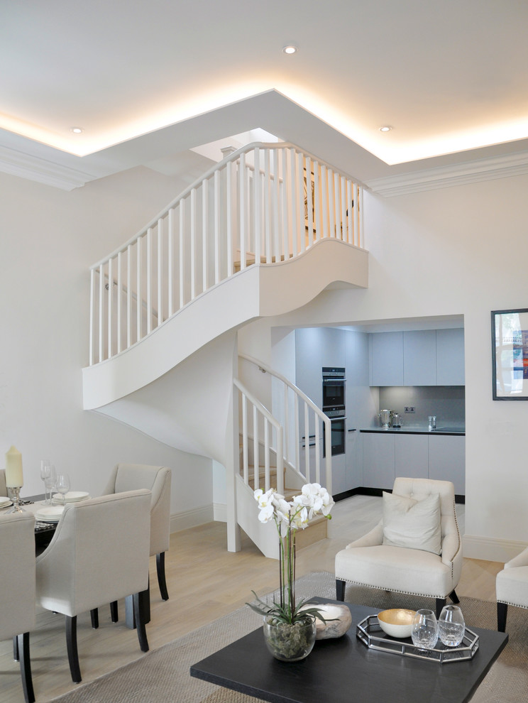 This is an example of a mid-sized transitional staircase in London.