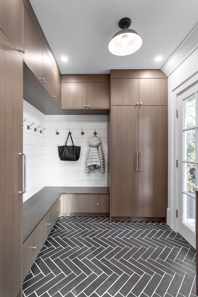 Mid-sized transitional mudroom in Vancouver with porcelain floors, a single front door, a glass front door, white walls and grey floor.