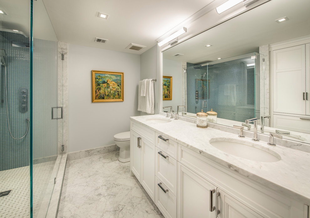 Design ideas for a mid-sized transitional master bathroom in Philadelphia with shaker cabinets, white cabinets, an open shower, grey walls, marble floors, an undermount sink, marble benchtops and grey floor.