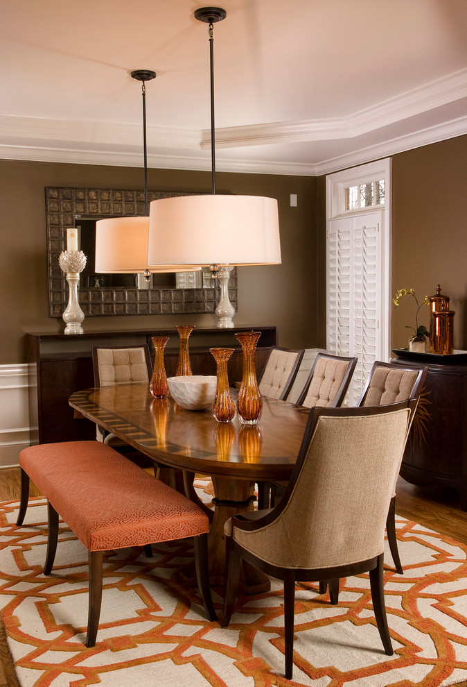 Design ideas for a contemporary dining room in San Diego with brown walls.